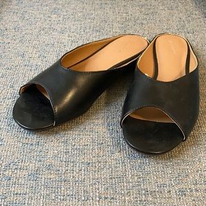 Peep toe black flats